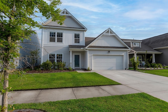 408 Fox Sparrow Ct, Summerville, SC 29486 - view of front of house with board and batten siding, a garage, concrete driveway, and a front lawn