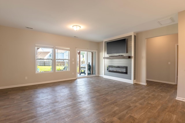 408 Fox Sparrow Ct, Summerville, SC 29486 - unfurnished living room featuring dark wood finished floors, a large fireplace, and baseboards