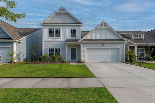 408 Fox Sparrow Ct, Summerville, SC 29486 - view of front facade featuring board and batten siding, a garage, concrete driveway, and a front lawn