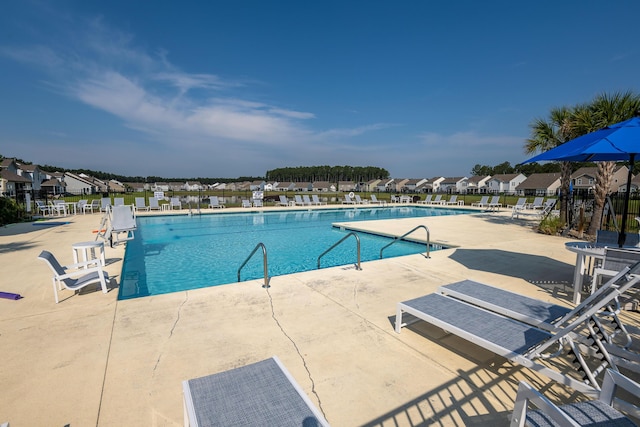 408 Fox Sparrow Ct, Summerville, SC 29486 - community pool with a patio and a residential view
