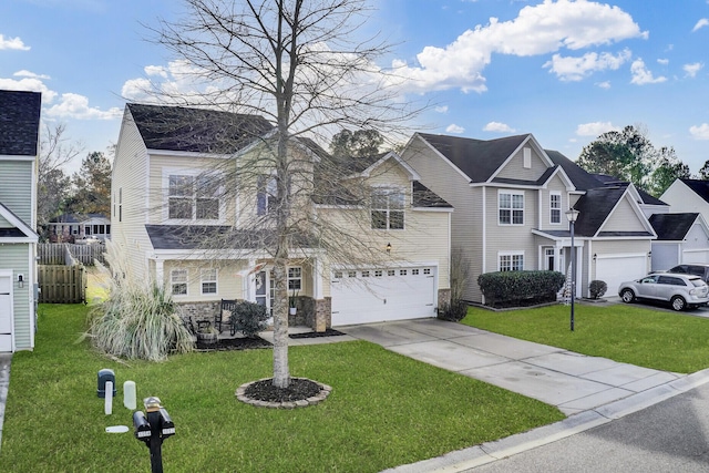 view of front of property with a garage and a front lawn