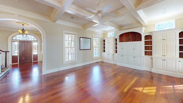 foyer featuring coffered ceiling, beam ceiling, dark wood-type flooring, and ceiling fan with notable chandelier