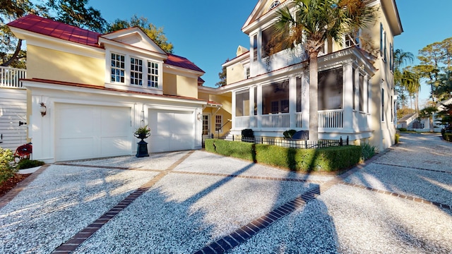 view of front of property featuring a garage