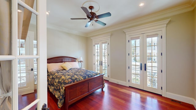 bedroom with ornamental molding, hardwood / wood-style floors, access to exterior, and french doors