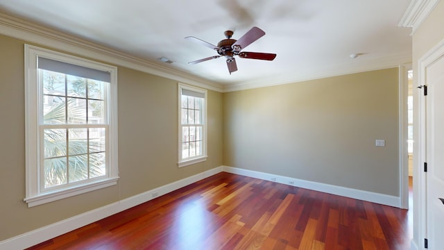 unfurnished room featuring crown molding, dark hardwood / wood-style floors, and ceiling fan