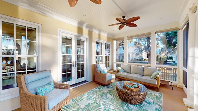 sunroom with french doors and ceiling fan