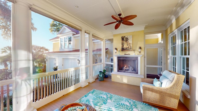 exterior space with plenty of natural light and ceiling fan