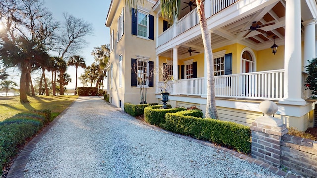 view of property exterior with ceiling fan