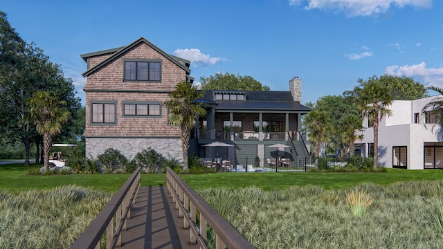 27 Rebellion Rd, Charleston, SC 29407 - back of house with a chimney, stone siding, metal roof, and a standing seam roof