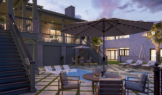 27 Rebellion Rd, Charleston, SC 29407 - view of patio / terrace with stairs, a balcony, outdoor dining space, and a ceiling fan