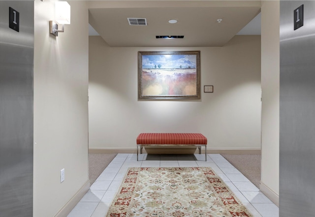 living area with light tile patterned floors