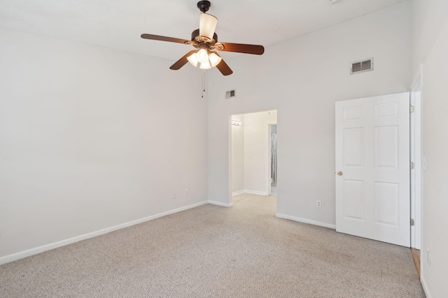 1505 Blaze Ln, Charleston, SC 29412 - unfurnished room featuring light colored carpet, high vaulted ceiling, and a ceiling fan
