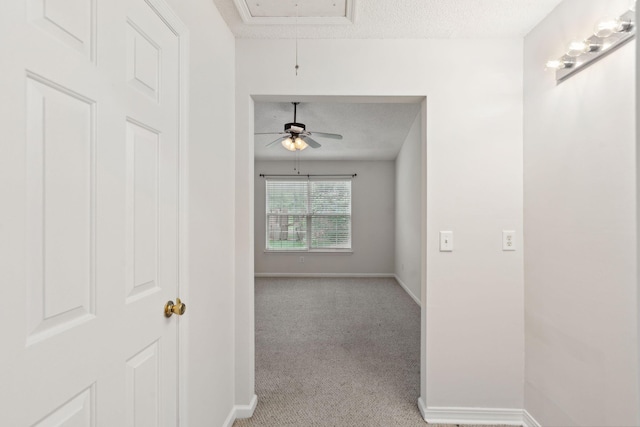 1505 Blaze Ln, Charleston, SC 29412 - hall with attic access, light colored carpet, and a textured ceiling