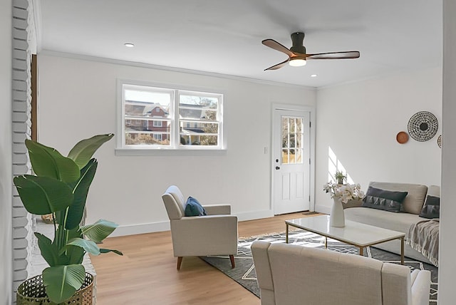 5259 Hartford Cir N, Charleston, SC 29405 - living area featuring crown molding, light wood-style flooring, a ceiling fan, baseboards, and recessed lighting