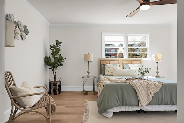 5259 Hartford Cir N, Charleston, SC 29405 - bedroom with crown molding, wood finished floors, baseboards, and ceiling fan
