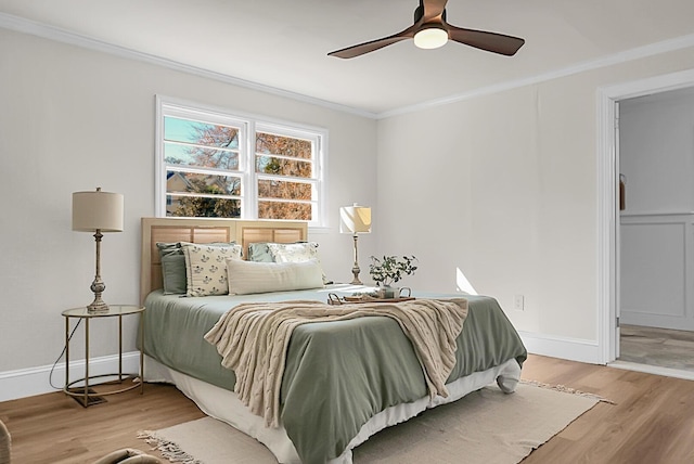 5259 Hartford Cir N, Charleston, SC 29405 - bedroom with crown molding, light wood-style floors, baseboards, and a ceiling fan