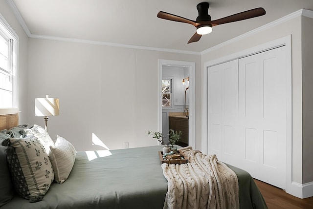 5259 Hartford Cir N, Charleston, SC 29405 - bedroom with ornamental molding, wood finished floors, a closet, ceiling fan, and a sink