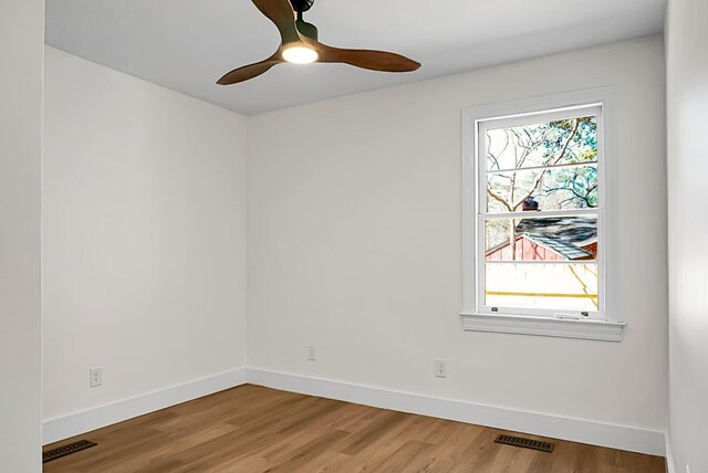 5259 Hartford Cir N, Charleston, SC 29405 - spare room with baseboards, light wood-style floors, and a ceiling fan