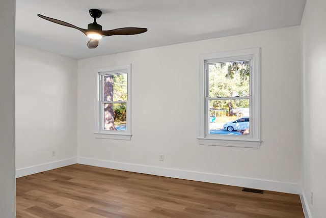 5259 Hartford Cir N, Charleston, SC 29405 - empty room featuring light wood finished floors, baseboards, and a ceiling fan