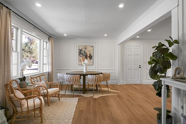 5259 Hartford Cir N, Charleston, SC 29405 - living area with a decorative wall, light wood-type flooring, crown molding, and recessed lighting