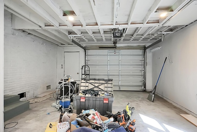 5259 Hartford Cir N, Charleston, SC 29405 - garage featuring a garage door opener