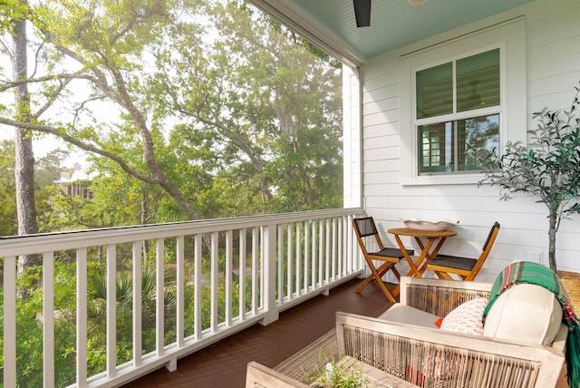 balcony featuring ceiling fan