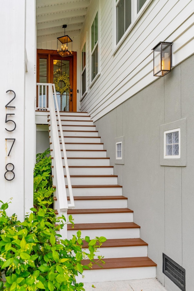 doorway to property featuring visible vents