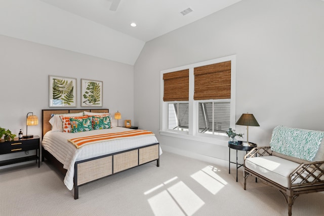 carpeted bedroom featuring baseboards, recessed lighting, vaulted ceiling, and visible vents