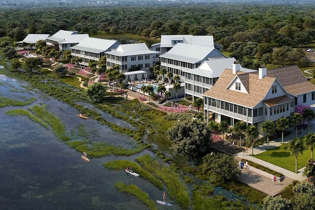 birds eye view of property featuring a water view and a forest view