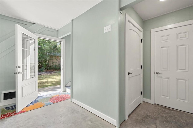 foyer featuring concrete floors