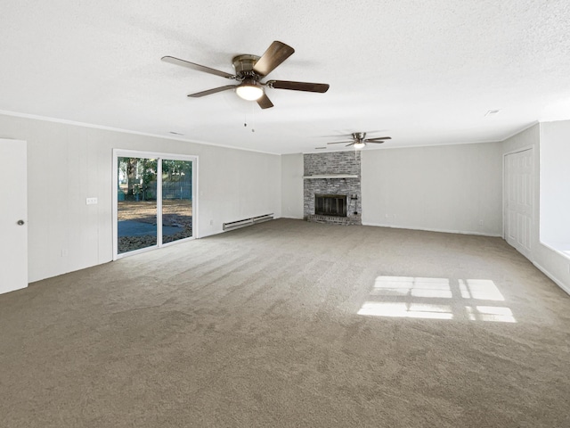 unfurnished living room with a baseboard heating unit, ceiling fan, ornamental molding, a textured ceiling, and a fireplace