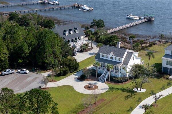 view of subject property with a nearby body of water