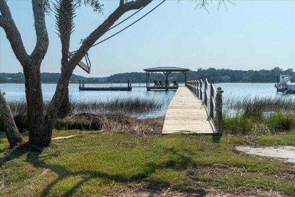 dock area featuring a water view