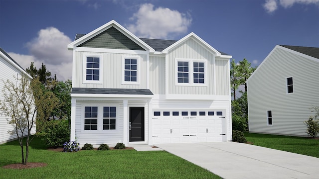 view of front of home featuring a front yard and a garage