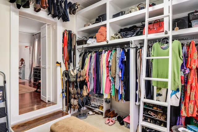 spacious closet with wood finished floors