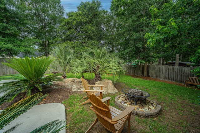 1617 Southwick Dr, Johns Island, SC 29455 - fenced backyard with a fire pit