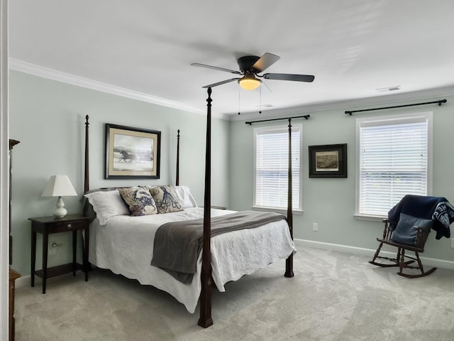 bedroom featuring light colored carpet, baseboards, ornamental molding, and visible vents