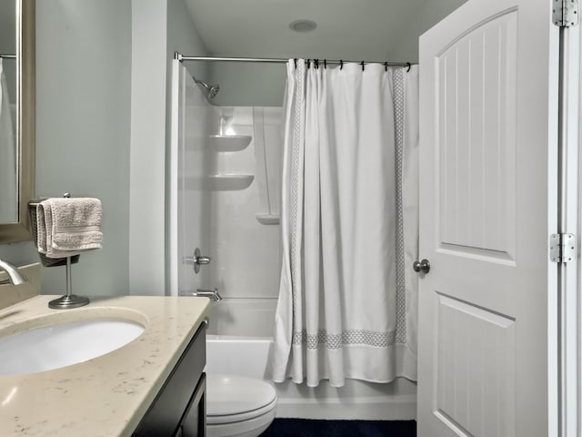 full bathroom featuring toilet, shower / tub combo, and vanity