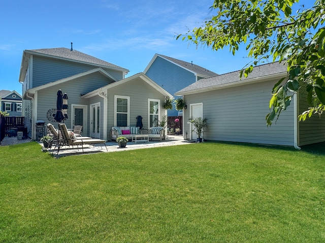 back of property featuring a patio area, fence, and a lawn
