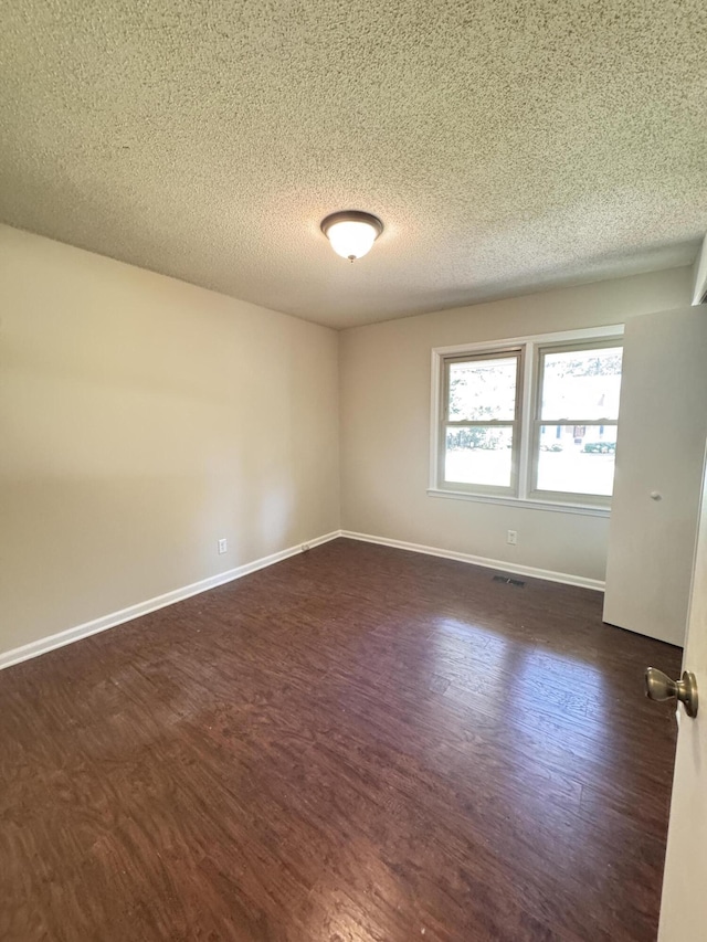 449 Estates Dr, Walterboro, SC 29488 - unfurnished room with dark wood-style floors and a textured ceiling