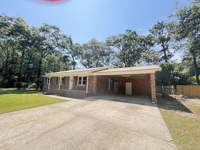 449 Estates Dr, Walterboro, SC 29488 - ranch-style home featuring driveway, brick siding, an attached carport, and a porch