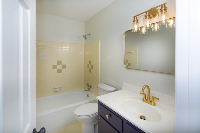 bathroom with toilet, vanity, and shower / tub combination