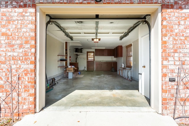 garage featuring a garage door opener