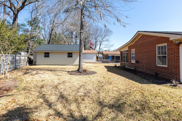 view of yard with fence