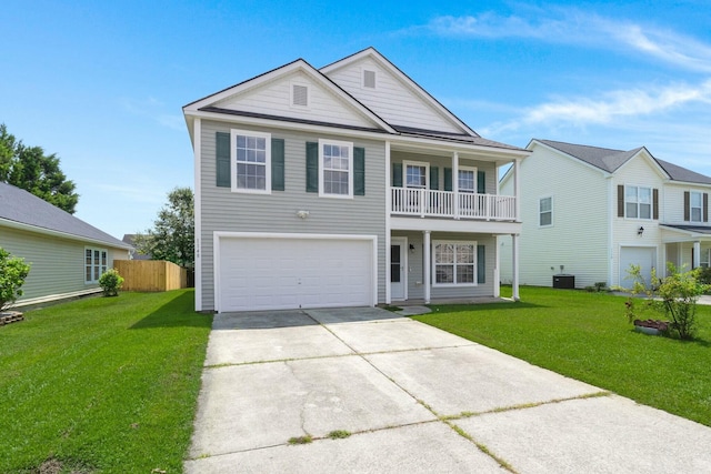 front of property featuring a garage, a front lawn, and central air condition unit