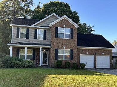 view of front of home with a front yard