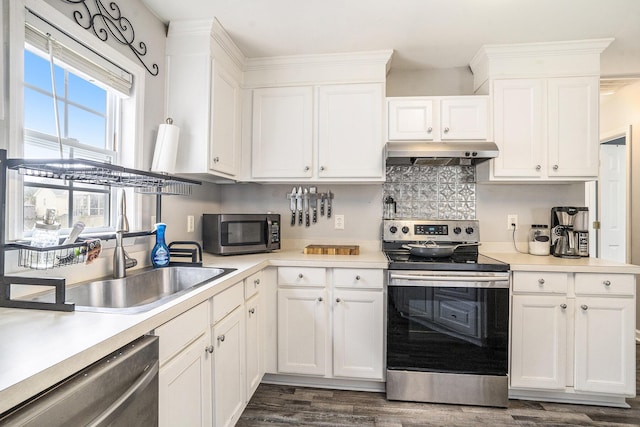 4987 Ballantine Dr, Summerville, SC 29485 - kitchen featuring stainless steel appliances, under cabinet range hood, light countertops, and white cabinetry