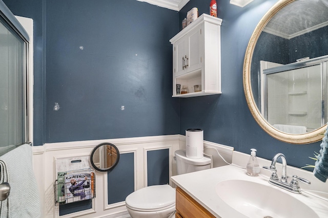 4987 Ballantine Dr, Summerville, SC 29485 - full bath featuring toilet, wainscoting, vanity, a shower with shower door, and ornamental molding