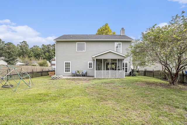 4987 Ballantine Dr, Summerville, SC 29485 - back of house with a chimney, a patio, and a sunroom