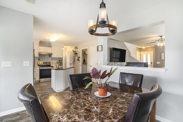 4987 Ballantine Dr, Summerville, SC 29485 - dining space featuring dark wood-style flooring, baseboards, a chandelier, and a ceiling fan